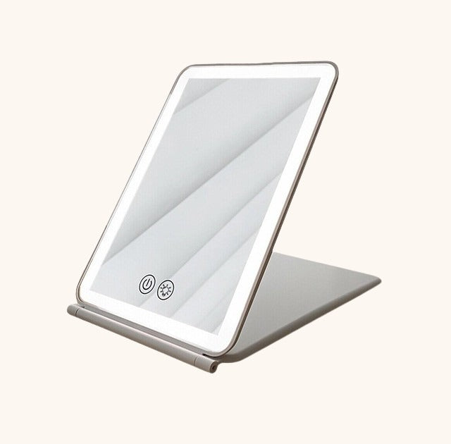 Folding Makeup Led MirrorIntroducing our Folding Makeup LED Mirror, the ultimate companion for flawless makeup application and grooming on the go. This compact and sleek mirror combines conv